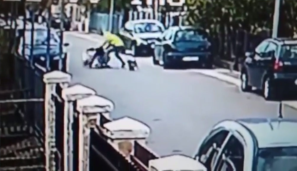  As the mugger pounces on the woman, he isn't betting on a dog intervening to thwart his crime