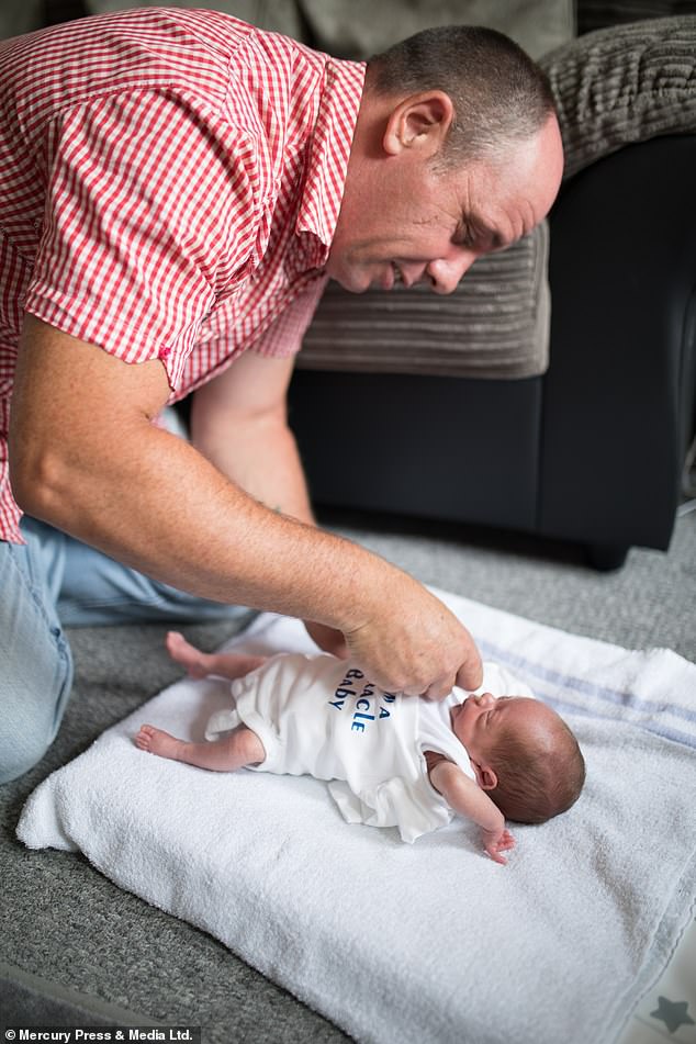 Paul said that Helen gave him strength during her illness. Four-week-old Harvey is the garden landscaper's first child