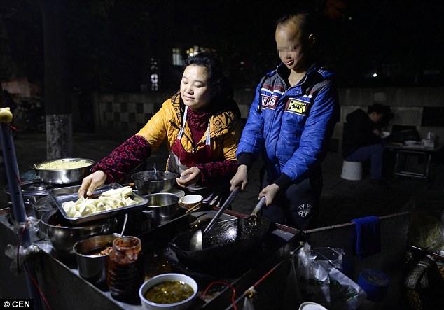 Devoted mother: His mother sells food at a snack stand during the evenings to keep them financially afloat