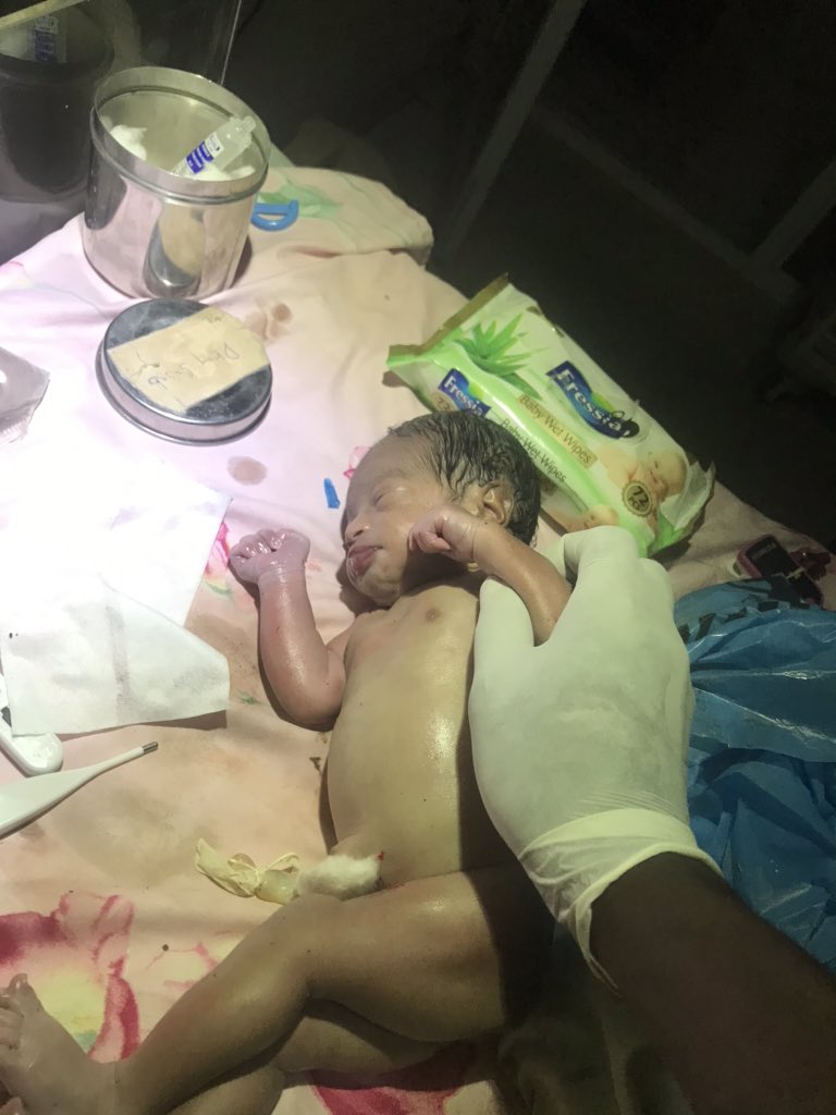 Nigerian doctor recounts how police officers rescued a baby girl dumped inside a dustbin (Photos, Videos)