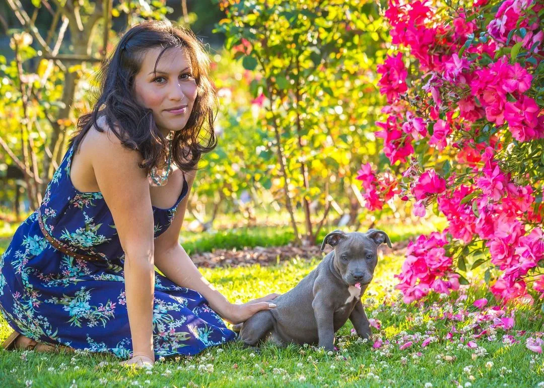 woman and cute dog sitting